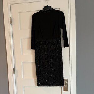 Black cocktail dress by Adrianna Papell